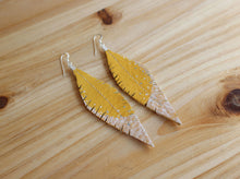 Load image into Gallery viewer, Mustard Yellow Reclaimed Leather Feather Earrings, Silver Tips
