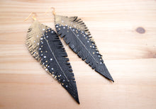 Load image into Gallery viewer, Long Black Reclaimed Leather Feather Earrings, Gold Tops
